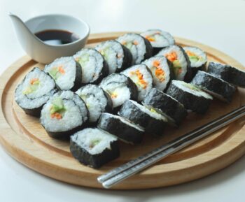 sushi with soy sauce and chopsticks