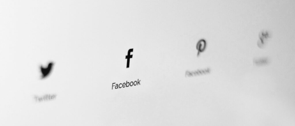 social media in black and white: twitter, facebook (meta), pinterest,